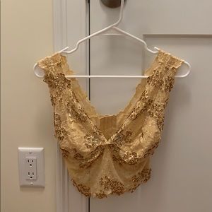 Lace and sequins gold Bebe top never worn